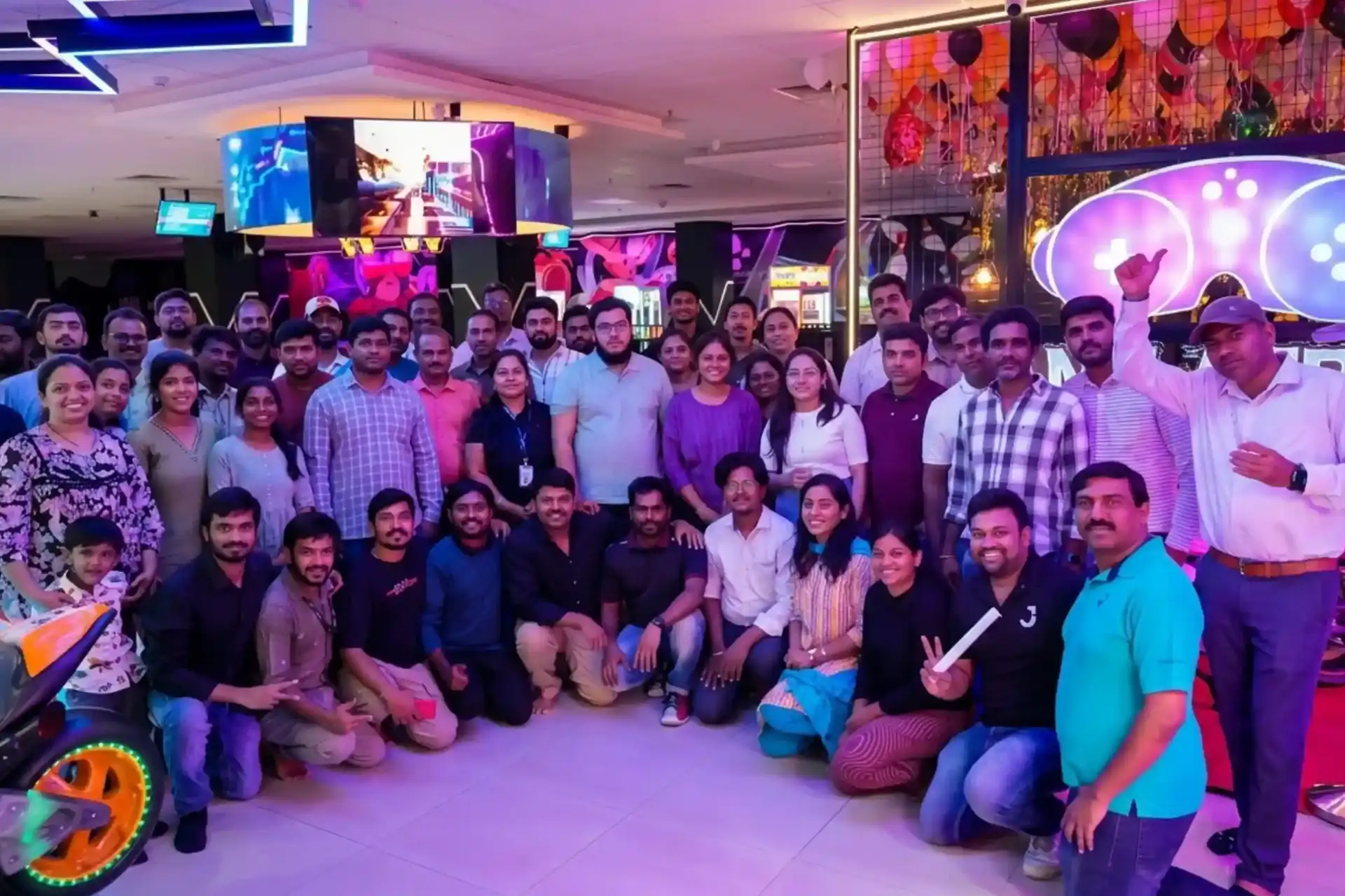 Corporate team outing group photo at Game Xtreme Hyderabad bowling lanes