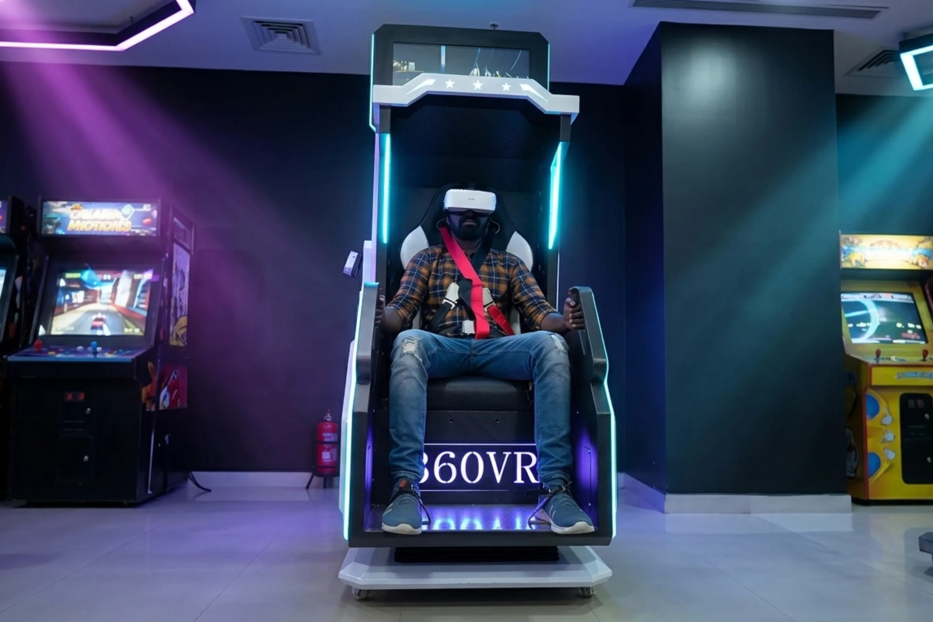 Rider strapped into the 360 VR chair at Game Xtreme Hyderabad