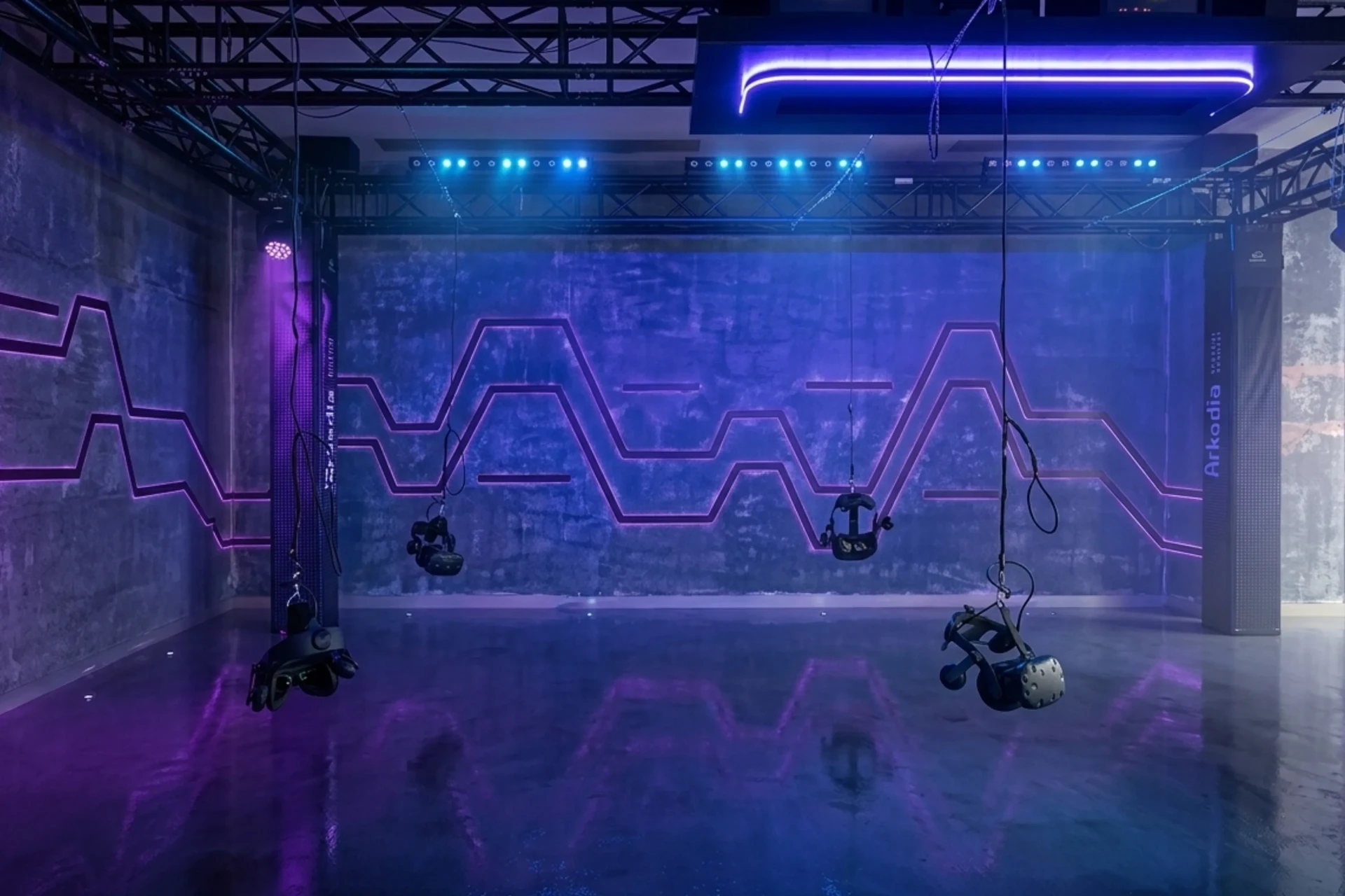 Free-roam VR arena Hyderabad — Arkadia neon-lit floor